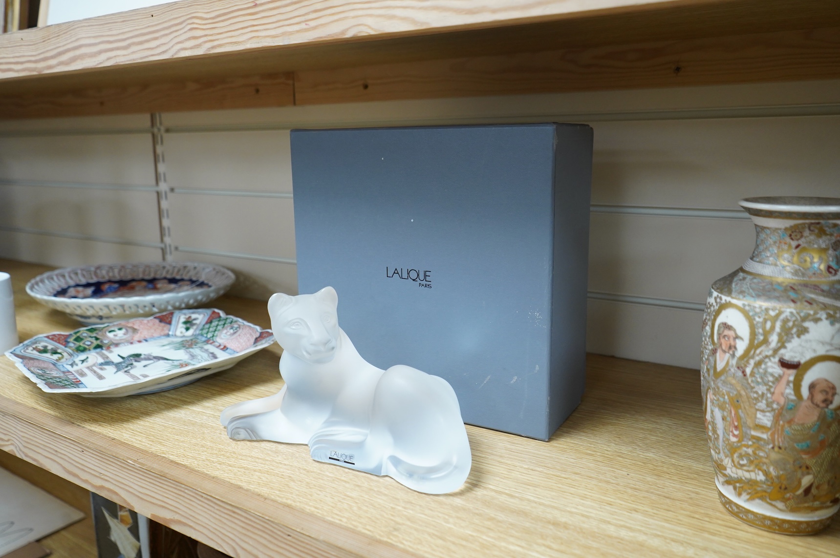 A Lalique glass figure, ‘Simba Lioness’, signed to the base, boxed, 24cm wide